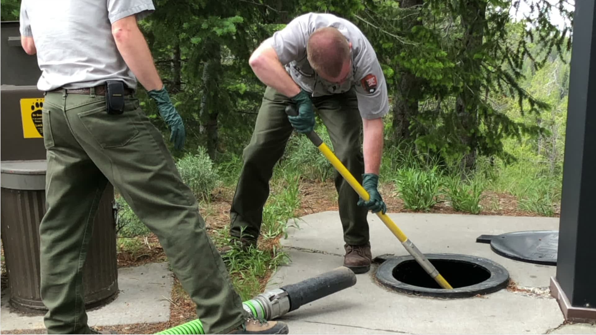 Technician clearing a residential drain line in Macomb County